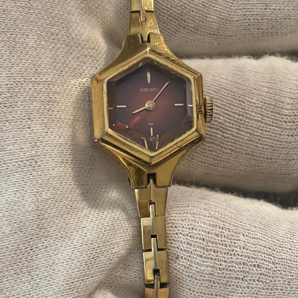 Vintage Seiko Japan red , dainty gold watch